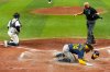 Milwaukee Brewers' William Contreras celebrates after scoring during the sixth inning of Game 5 of baseball's World Series, Wednesday, Oct. 28, 2026, in St. Petersburg, Fla., between the Milwaukee Brewers and the Tampa Bay Rays. (AP Photo/Ashley Landis)