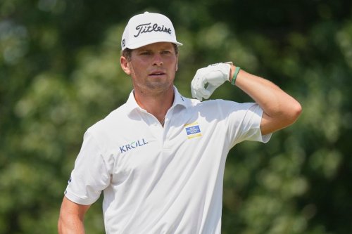 Michael Brennan prepares to hit from the fifth tee during the third round of the BMW Championship golf tournament Saturday, Aug. 22, 2026, in St. Louis. (AP Photo/Jeff Roberson)