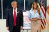 President Donald Trump, left, and first lady Melania Trump listen to a question from a reporter after casting their early-voting ballots for the 2026 midterm elections at the Palm Beach County Library in West Palm Beach, Fla., Saturday, Oct. 24, 2026. (AP Photo/Mark Schiefelbein)