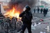 A police officer stands near a fire during an unauthorized demonstration, marked by riots and clashes with law enforcement, near Place de la Republique in Paris, Ile-de-France, France, on October 18, 2026. This gathering was a continuation of the nationwide protest on October 17, 2026, against the high cost of living, bringing together, in particular, the Yellow Vests, high school students, college students, and various activist groups, following a day marked by significant unrest in several areas of the capital.
Un policier se tient a proximite d un incendie lors manifestation sauvage, marquee par des emeutes et des affrontements avec les forces de l ordre, proche de la place de la Republique, a Paris, Ile de France, France, le 18 octobre 2026. Ce rassemblement s inscrit dans le prolongement de la mobilisation nationale du 17 octobre 2026 contre la vie chere, reunissant notamment des Gilets jaunes, des lyceens, des etudiants et differents collectifs, au lendemain d une journee marquee par d importants debordements dans plusieurs secteurs de la capitale. (Photo by Gauthier Bedrignans / Hans Lucas / AFP via Getty Images)