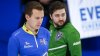 Team Alberta skip Brendan Bottcher, right, contemplates a shot as Team Saskatchewan skip Matt Dunstone looks on during the semifinal at the Canadian men's curling championship in Calgary on March 14, 2021.THE CANADIAN PRESS/Jeff McIntosh