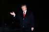 President Donald Trump waves while returning to the White House following a trip to Clarksville, Tenn., on the South Lawn of the White House, Saturday, Oct. 10, 2026, in Washington. (AP Photo/Nathan Howard)