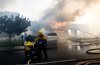 Firefighters work to save structures on Via La Mirada during the Norte fire in San Clemente, Calif., on Friday, Oct. 16, 2026. (Paul Bersebach/The Orange County Register via AP)
