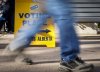 A voter arrives to cast their referendum vote at an advance polling station in Calgary on Tuesday, Oct. 13, 2026. THE CANADIAN PRESS/Jeff McIntosh