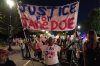 Demonstrators march from the Washington Monument to the White House during a 